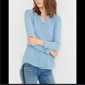 Lucky Brand Womanʻs casual button down top in light blue.